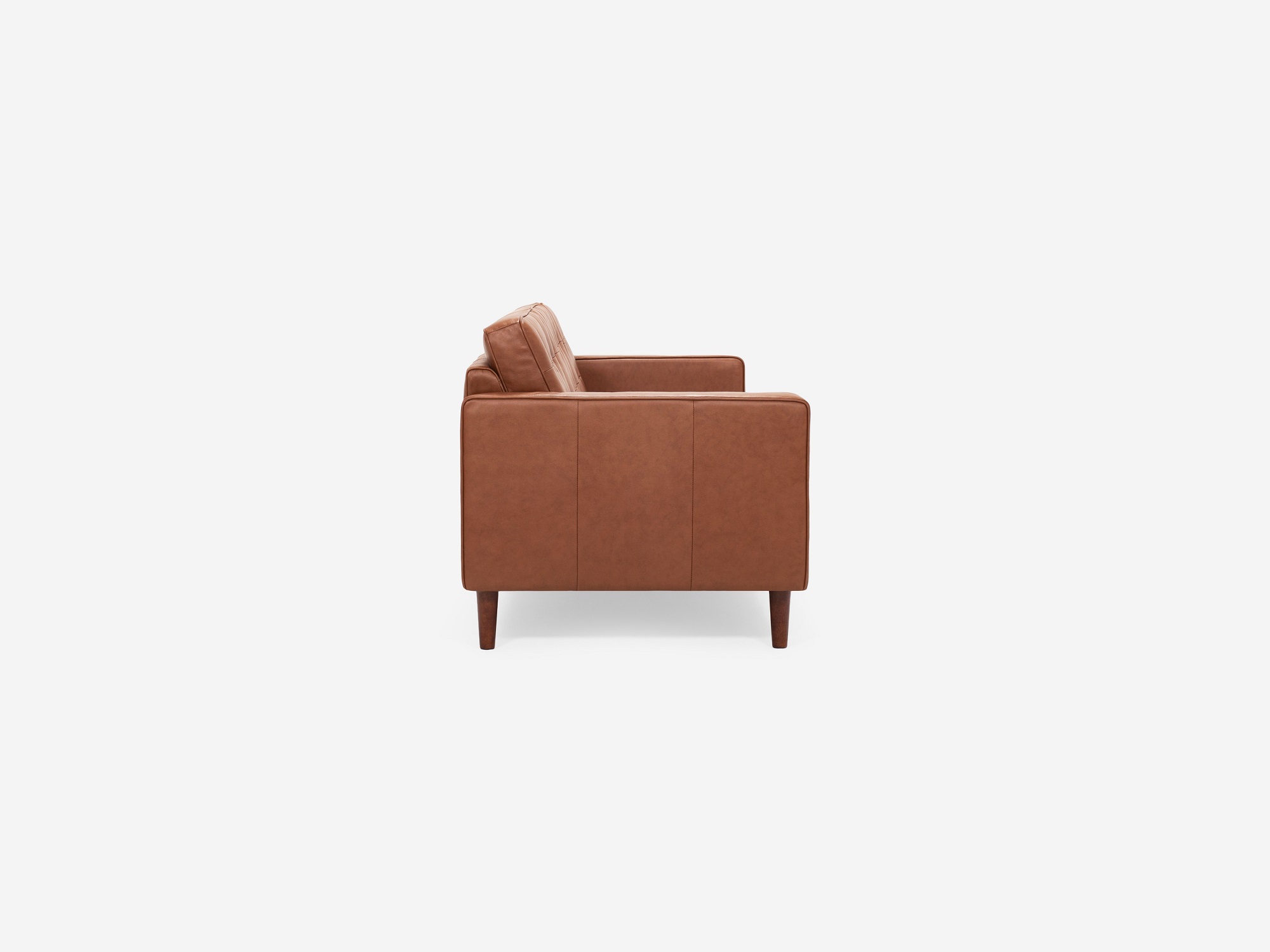 Side view of our mid century modern sofa, the Reverie 92", upholstered in red brown leather